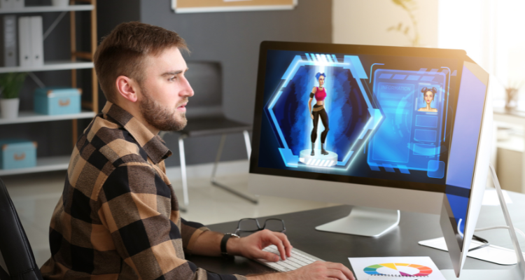 Student working at a desktop computer creating a 3D animated character on screen in a digital animation workspace
