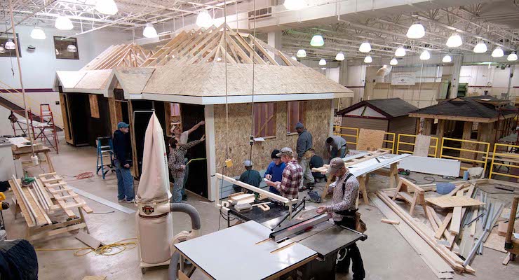 students building house in lab space