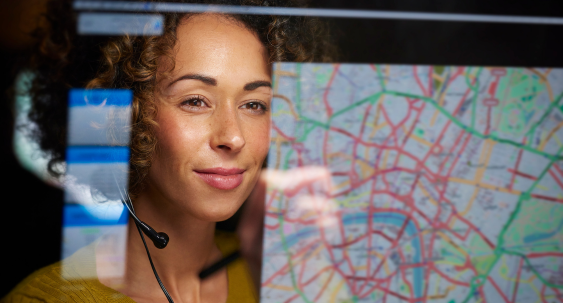 Female paramedic student working on a patient