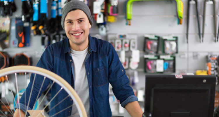 male managing bike shop