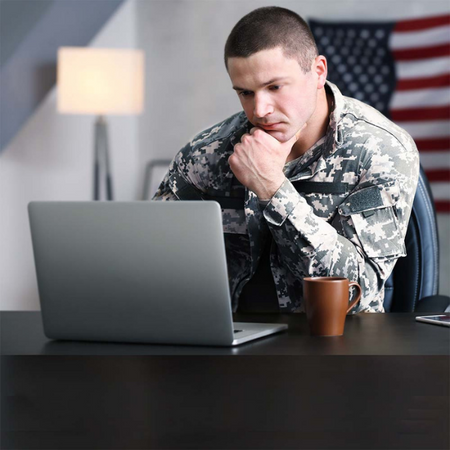 male military personnel on laptop