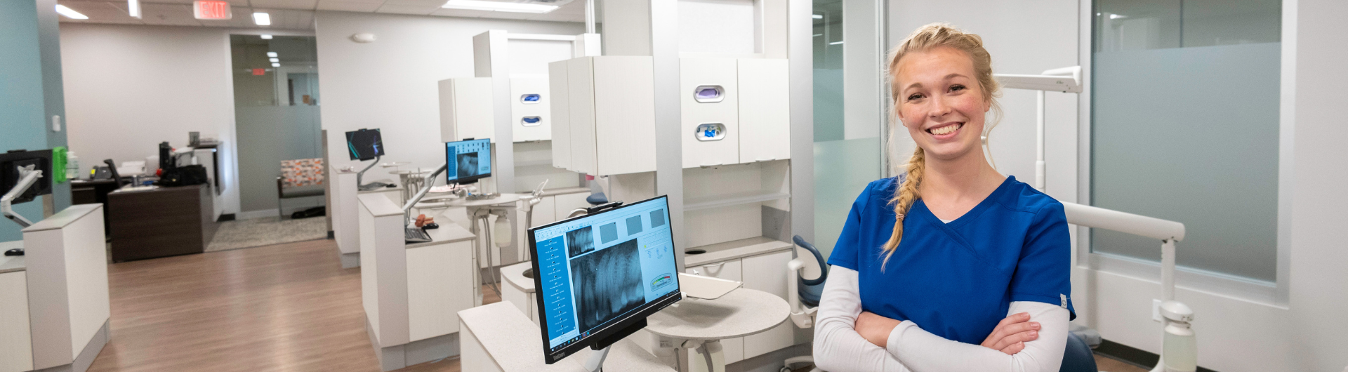 female dental student in lab