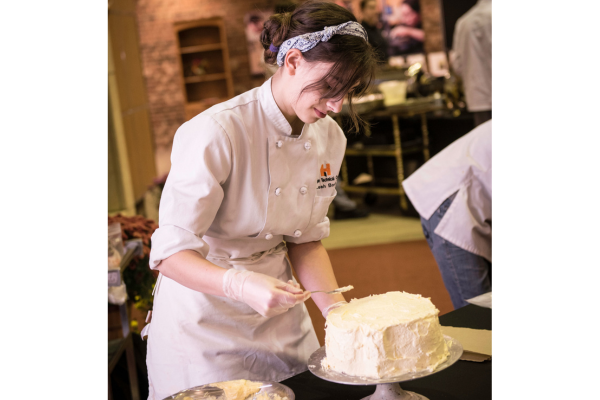 culinary student making cake