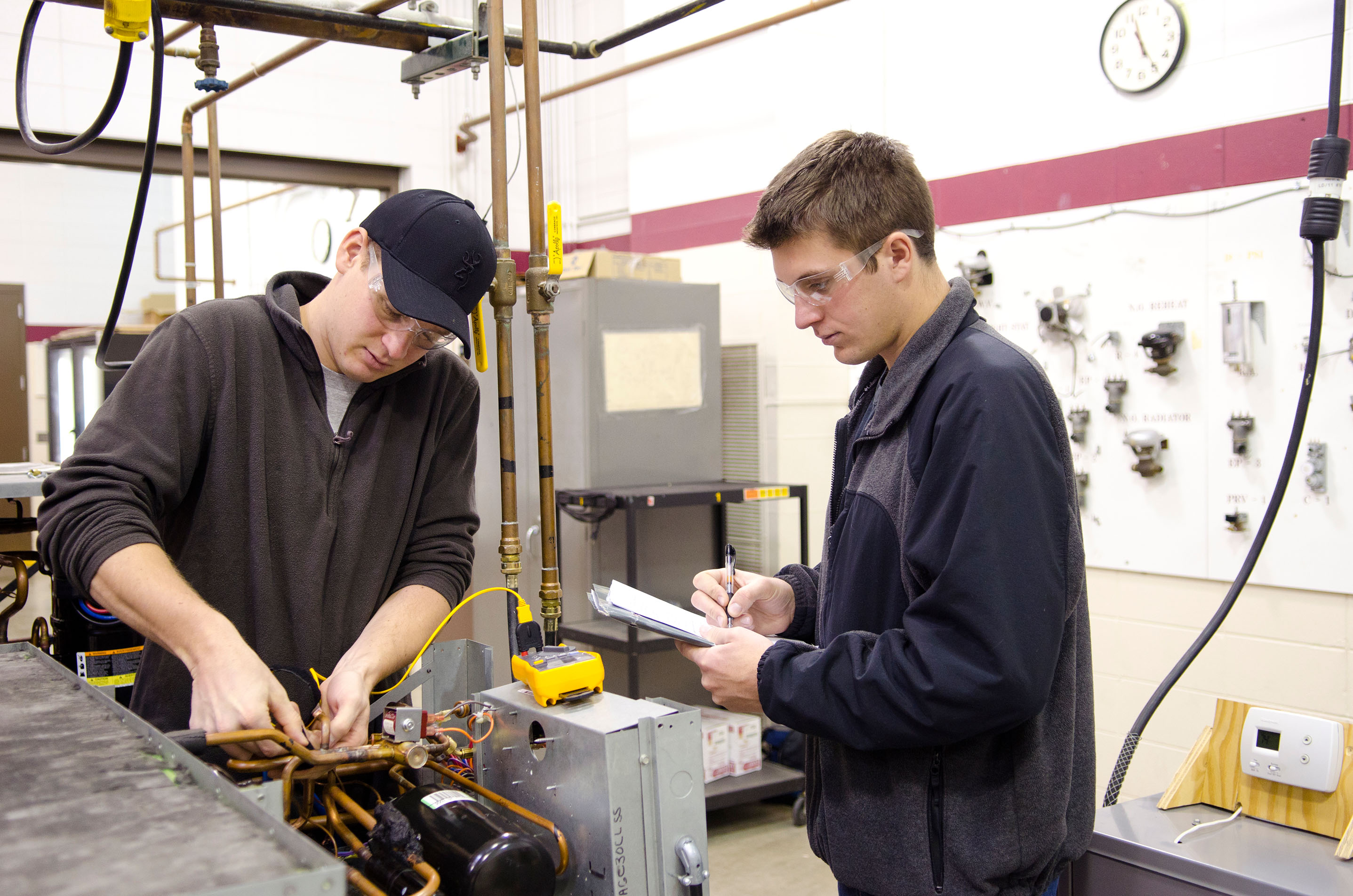 Two students in HVAC