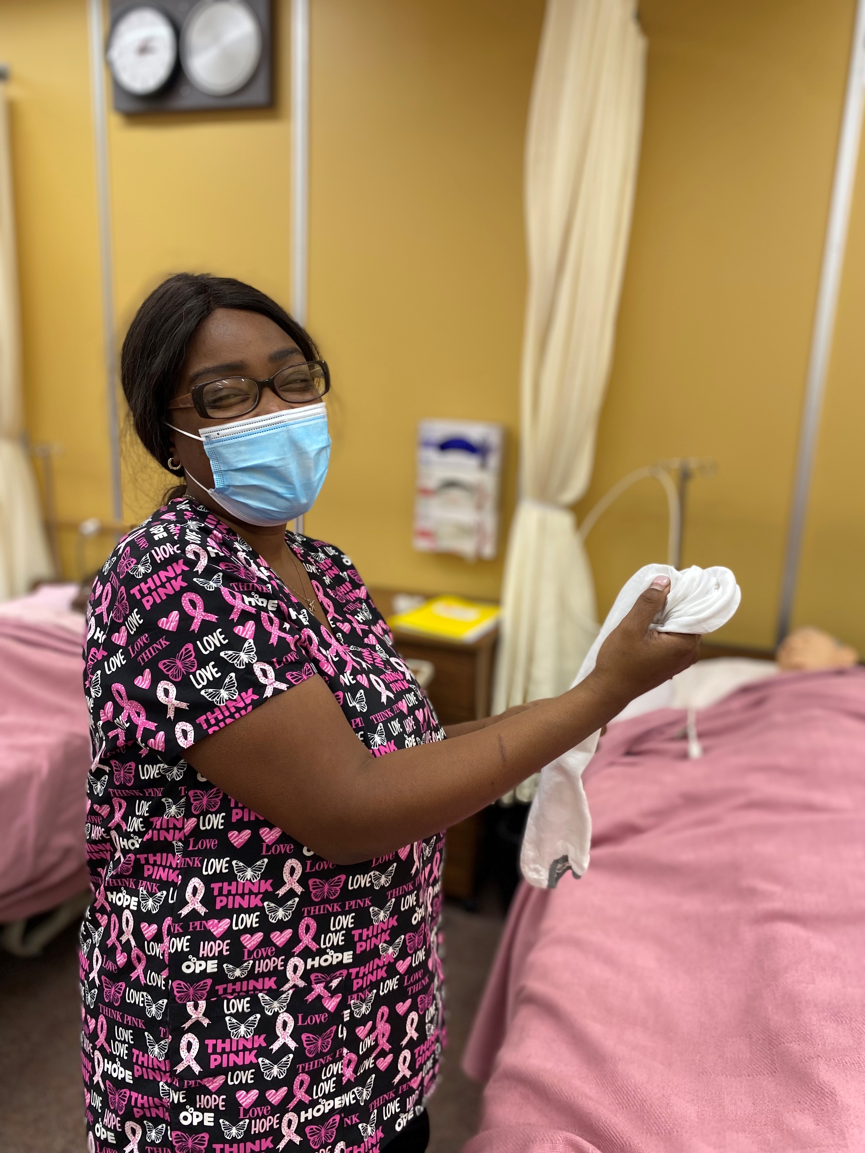 student training to become certified nursing assistant (cna)