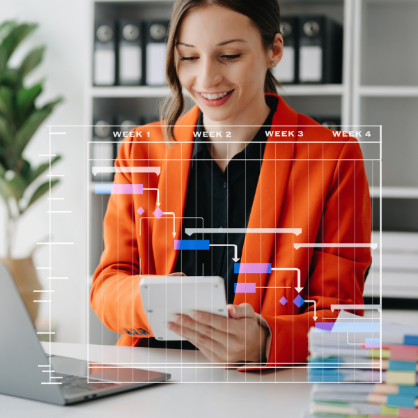 female working at computer organizing tasks