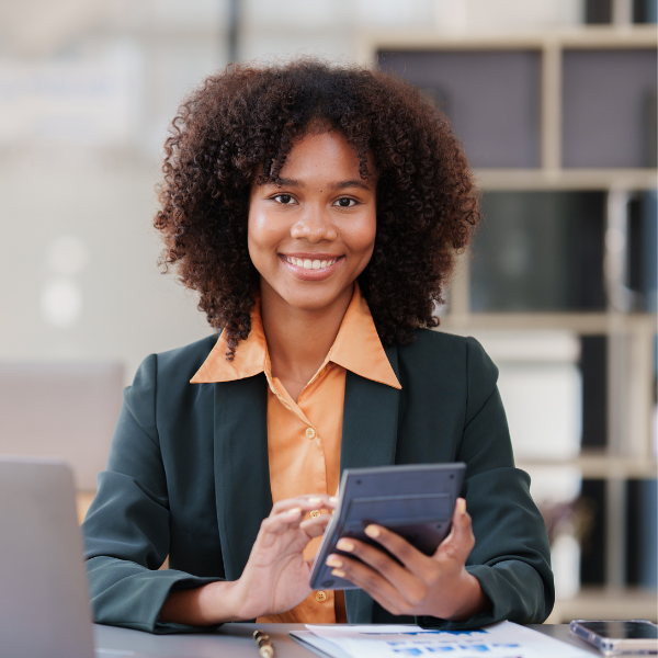 Woman using calculator